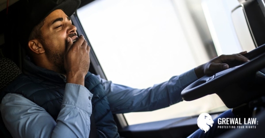Truck driver yawning